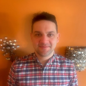 Teacher Andrew Charlesimage